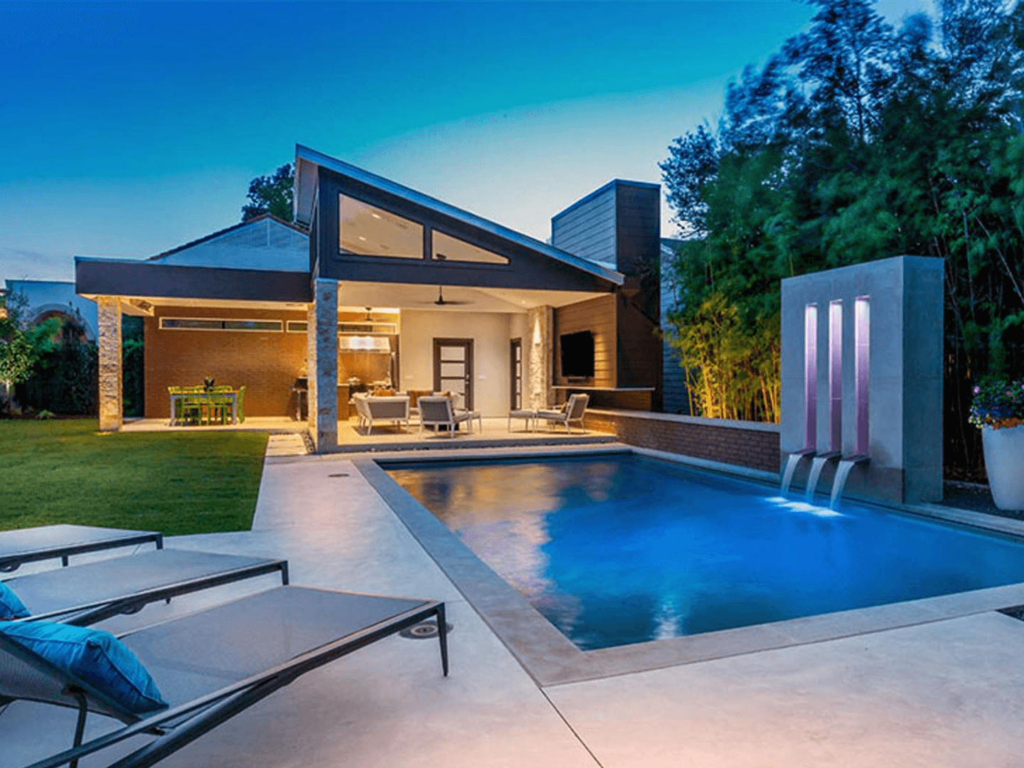 Premium quartz-finished residential pool at twilight